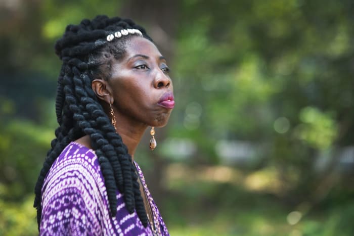 Marquetta Goodwine, also known as Queen Quet, is proud her people left the coastline alone, particularly the stretches of salt marshes critical as habitats. Marquetta Goodwine, also known as Queen Quet, chieftess of the Gullah-Geechee Nation, is pictured at an outdoor market on St. Helena Island on Saturday, April 15, 2017. © LAUREN PETRACCA/Staff